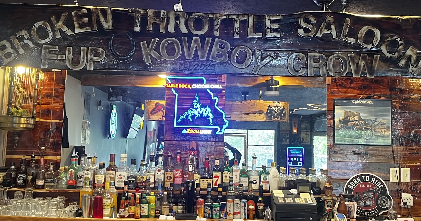 Broken Throttle Bar & Grill carved sign above the bar